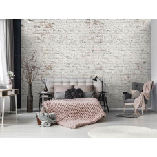 Eine Fototapete mit einer weißen Ziegelwand im Industriedesign, ideal für ein Schlafzimmer.