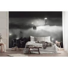 Eine Fototapete mit Wolkenkratzern in der Nacht in New York, mit Wolken für das Schlafzimmer.