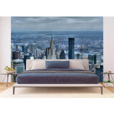 Ein Fototapet von Wolkenkratzern in der Skyline von New York in einem Schlafzimmer.