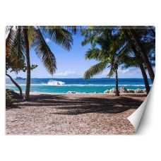 Fotobehang met zandstrand tussen palmbomen in blauwe tinten