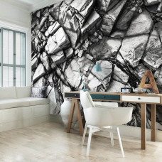 Eine Fototapete mit silbernen Felsen und Steinen für das Wohnzimmer.