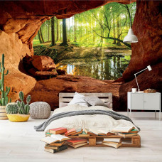 Eine Fototapete von einem sonnigen Wald aus einer Höhle mit einem bezaubernden Blick in einem Kinderzimmer.