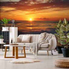 Fototapete Sonnenuntergang am Meer mit Naturlandschaft im Wohnzimmer.