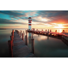 Fototapete mit einem Sonnenuntergang an einem Küstenleuchtturm, mit einem schönen Blick auf das Meer und die Natur.