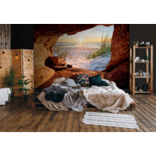 Eine Fototapete von einem Sonnenuntergang über dem Meer im nahtlosen Design für ein Schlafzimmer.