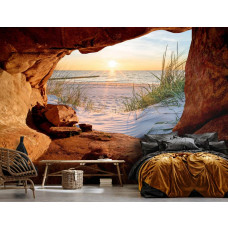 Eine Fototapete von einem Sonnenuntergang über dem Meer, gesehen aus einer Höhle im 3D-Perspektive, in einem stimmungsvollen Schlafzimmer.