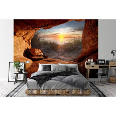 Eine Fototapete von einem Sonnenuntergang aus einer Höhle mit einer ruhigen Ausstrahlung in einem Schlafzimmer.