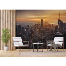 Fototapete von einem magischen Sonnenuntergang über den Wolkenkratzern der New Yorker Skyline in einem Büro.