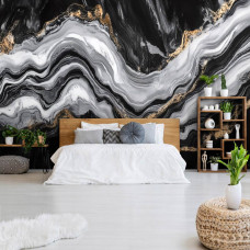 Fotobehang met elegante gouden aders in zwart marmer in een moderne slaapkamer.