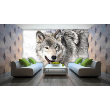 Eine Fototapete mit einem Wolf in einer verschneiten Umgebung für das Wohnzimmer.