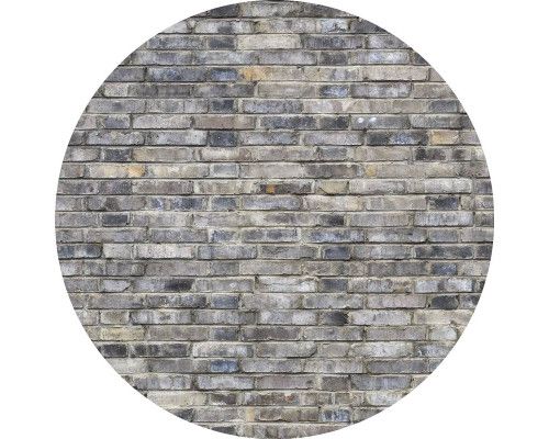 Grijze stenen muur, afgebeeld op een industriële behangcirkel.