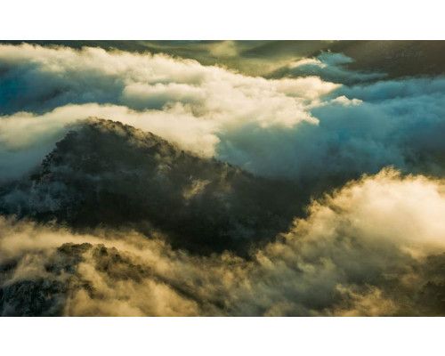 Cap de Formentor Fototapete mit Wolken und Blick auf Mallorca.