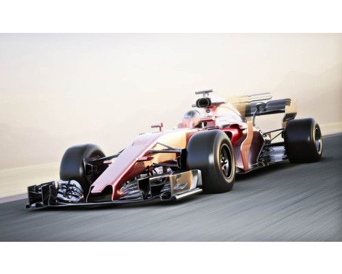 Fototapete mit einem Ferrari Formel 1 Auto bei Höchstgeschwindigkeit, für eine ikonische Rennatmosphäre.