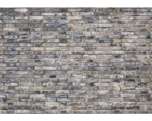 Fototapete einer grauen Steinmauer mit Industrie-Look.