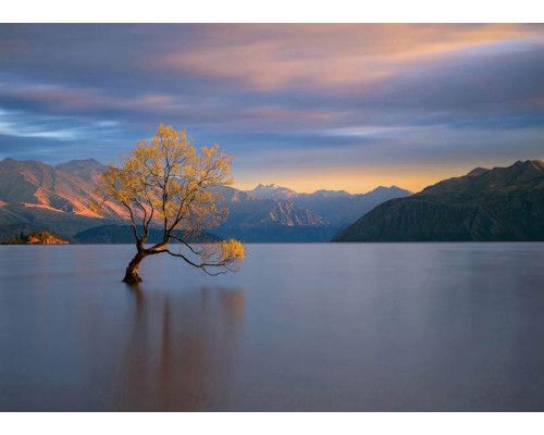 Fototapete Magischer Sonnenuntergang am Bergmeer