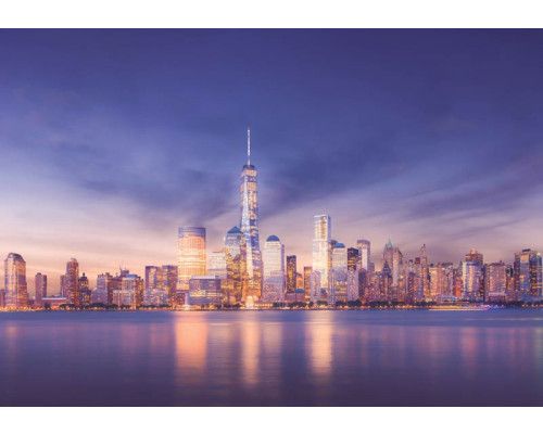 Fototapete von New York mit Wolkenkratzern bei Nacht.