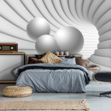 Eine Fototapete mit einem futuristischen 3D-Tunnel mit Kugeln, geeignet für das Schlafzimmer.