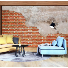Eine industrielle Fototapete von einer roten Ziegelwand mit Betonelementen im Wohnzimmer.