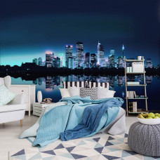 Fototapete einer Stadt bei Nacht mit Lichtern, geeignet für ein Schlafzimmer.