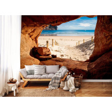 Eine Fototapete mit einer Höhle mit Blick auf den Strandweg im Wohnzimmer.