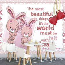 Eine Fototapete mit Häschen, Herzen und einem Spruch für Kinder im Babyzimmer und Kinderzimmer.