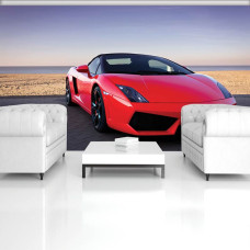 Eine Fototapete mit einem roten Lamborghini am Meer und Strand für das Wohnzimmer.