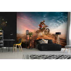 Eine Fototapete mit einem Motocross-Fahrer in Aktion in der Wüste im Jungenzimmer.