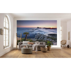 Eine Fototapete von einer tropischen Paradiesinsel in Mallorca, perfekt für das Wohnzimmer.