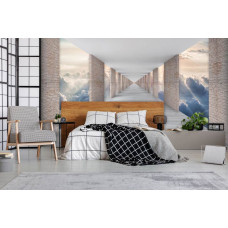 Eine Fototapete mit Tunnel und Wolkenansicht im 3D-Effekt für das Schlafzimmer.