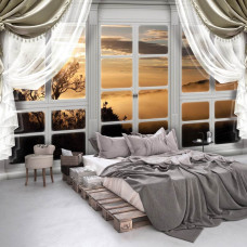 Eine Fototapete mit einer Waldansicht durch ein Fenster, perfekt für das Schlafzimmer.