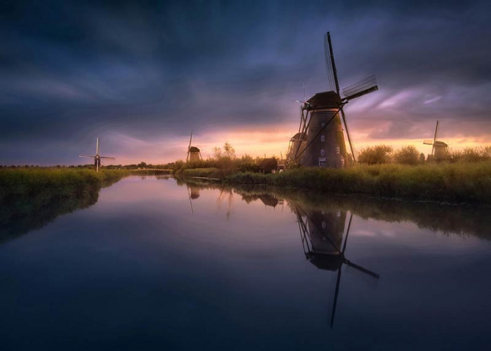 Fototapete Windmühlen bei Sonnenuntergang