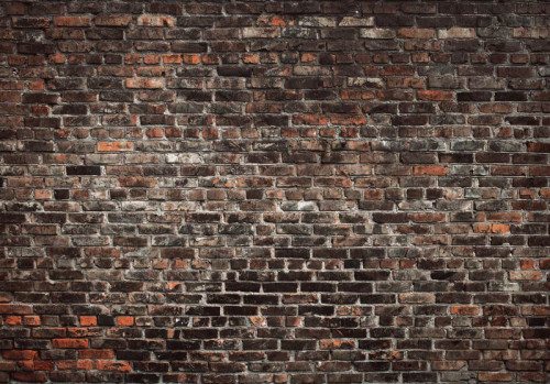 Fototapete einer industriellen Ziegelwand mit urbanem Flair.