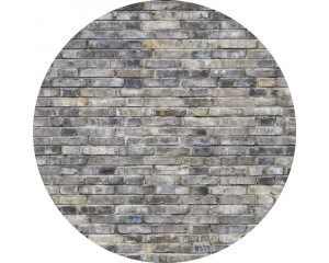 Grijze stenen muur, afgebeeld op een industriële behangcirkel.
