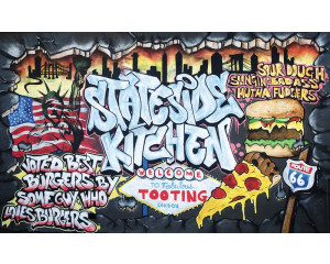 Fototapete mit Graffiti von Hamburgern, verspielt und modern.