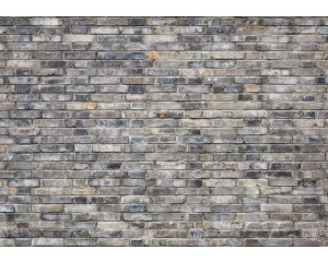 Fototapete einer grauen Steinmauer mit Industrie-Look.