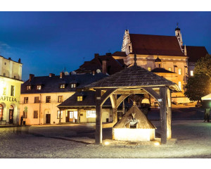 Stadtansichten von Kazimierz Dolny und Lublin, festgehalten auf einer historischen Fototapete.