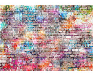 Fototapete einer bunten Graffiti-Wandmalerei auf Ziegelsteinen.