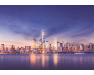 Fototapete von New York mit Wolkenkratzern bei Nacht.